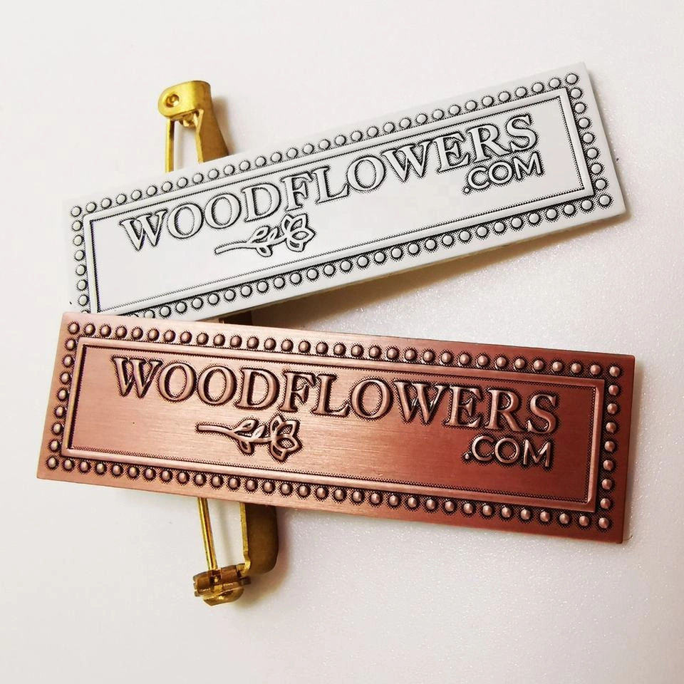 custom embossed aluminum label with metal pin backing