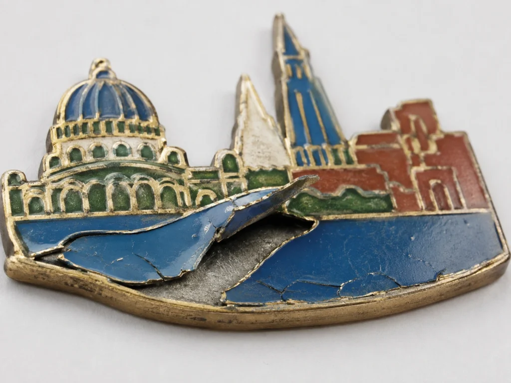 enamel fridge magnet lifted glaze delamination defect