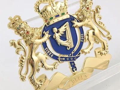 custom gold heraldic crest badge lion crown blue enamel side angle